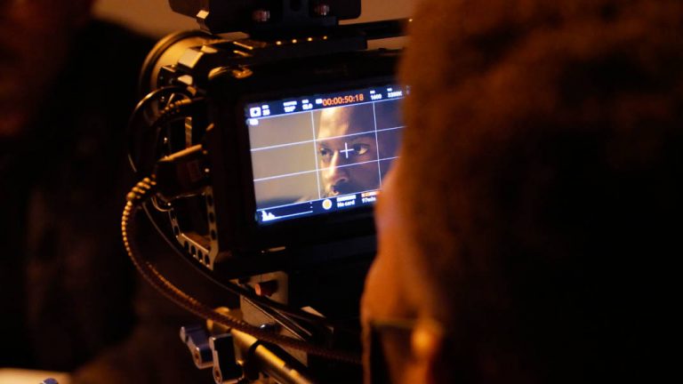 Behind the scenes of Paul Chinkwende actor on film set being filmed by Matthias Djan DOP